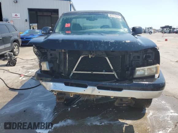 2006 Chevrolet Silverado 1500 LS z VIN 1GCEK19V36Z232083, wystawiony jako Copart lot #67372024 z przebiegiem Nie podano mil oraz Szkoda całkowita • Salvage title. Historia ofert i sprzedaży dostępna na DreamBid. Obrazek 5.