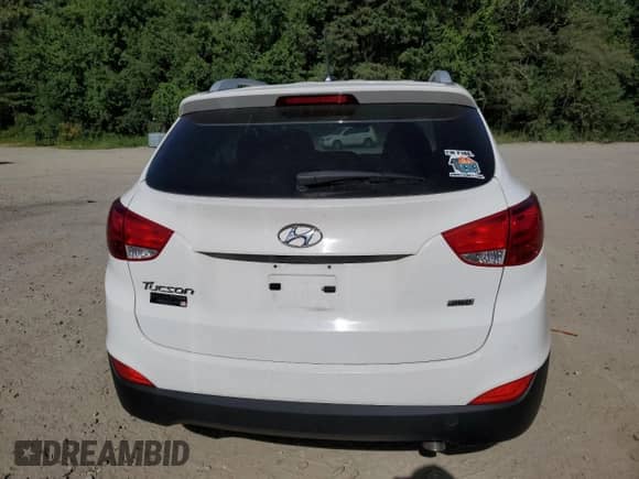 2014 Hyundai Tucson Limited z VIN KM8JUCAG7EU825583, wystawiony jako Copart lot #62934705 z przebiegiem 151 321 mil mil oraz Nie do naprawy • Non repairable. Historia ofert i sprzedaży dostępna na DreamBid. Obrazek 6.