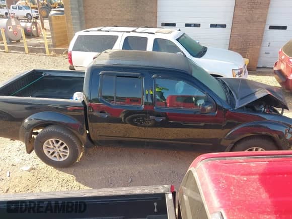 2020 Nissan Frontier SV with VIN 1N6ED0EB7LN726866, listed as a IAAI auction lot 42117413 with 57,458 mi miles and . Bid and sale history available at DreamBid. Image 13.