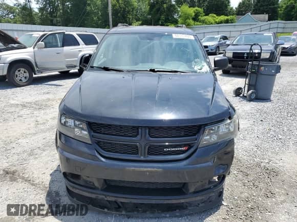 2017 Dodge Journey SE with VIN 3C4PDCAB8HT606195, listed as a Copart auction lot 60147455 with 125,120 mi miles and Salvage title. Bid and sale history available at DreamBid. Image 5.