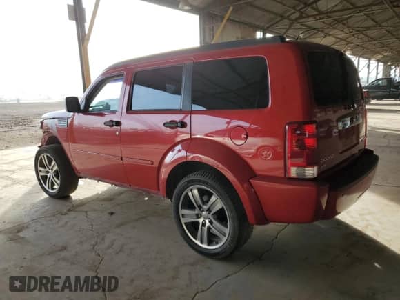 2011 Dodge Nitro Shock with VIN 1D4PT7GX0BW576191, listed as a Copart auction lot 42163725 with 141,029 mi miles and Salvage title. Bid and sale history available at DreamBid. Image 2.