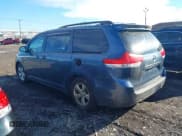 ✅ 2014 Toyota Sienna LE • VIN: 5TDKK3DCXES412410 • Lot: 43777852. Listed on IAAI with 228,333 mi. Free auction sales archive from the USA and detailed vehicle history report at DreamBid. Image 3.