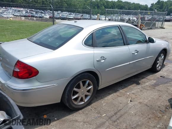 ✅ 2005 Buick LaCrosse CXS • VIN: 2G4WE567351274748 • Лот: 42705445. Опубликован ранее на IAAI с пробегом 99 318 миль. Бесплатный доступ к архиву аукционных продаж из США и подробный отчёт об истории автомобиля на DreamBid. Изображение 4.
