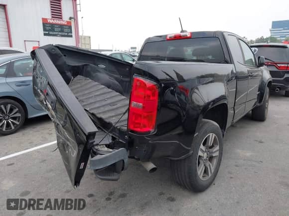 2018 Chevrolet Colorado 2WD Work Truck with VIN 1GCHSBEN1J1285106, listed as a IAAI auction lot 42408472 with 68,524 mi miles and . Bid and sale history available at DreamBid. Image 4.