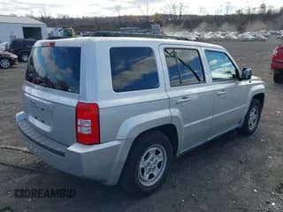 ✅ 2010 Jeep Patriot Sport • VIN: 1J4NF2GB9AD512612 • Лот: 43734590. Опубликован ранее на IAAI с пробегом 240 078 миль. Бесплатный доступ к архиву аукционных продаж из США и подробный отчёт об истории автомобиля на DreamBid. Изображение 4.