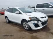 ✅ 2010 Mazda CX-7 Touring • VIN: JM3ER2WLXA0339558 • Lot: 42853958. Listed on IAAI with 106,842 mi. Free auction sales archive from the USA and detailed vehicle history report at DreamBid. Image 1.