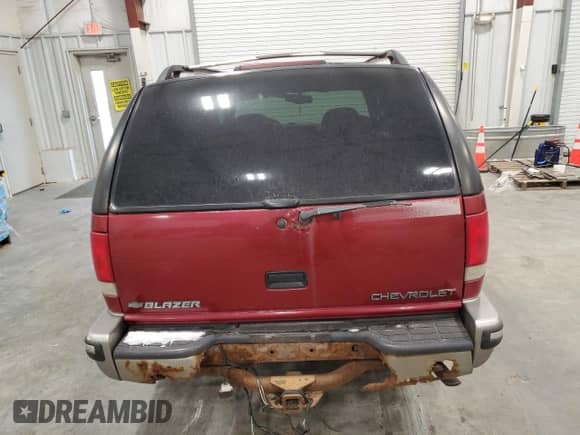 ✅ 1999 Chevrolet Blazer LS • VIN: 1GNDT13W7X2129972 • Lot: 83786284. Wystawiony na Copart z przebiegiem Nie podano. Bezpłatny archiwum sprzedaży aukcyjnych z USA i szczegółowy raport historii pojazdu na DreamBid. Zdjęcie 6.