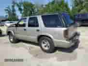 2004 Chevrolet Blazer Fleet z VIN 1GNCS13X84K110611, wystawiony jako Copart lot #54654165 z przebiegiem 153 610 mil mil oraz Szkoda całkowita • Salvage title. Historia ofert i sprzedaży dostępna na DreamBid. Obrazek 2.