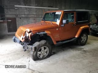 ✅ 2010 Jeep Wrangler Sahara • VIN: 1J4AA5D15AL186971 • Lot: 51141255. Wystawiony na Copart z przebiegiem 141 126 mil. Bezpłatny archiwum sprzedaży aukcyjnych z USA i szczegółowy raport historii pojazdu na DreamBid. Zdjęcie 1.