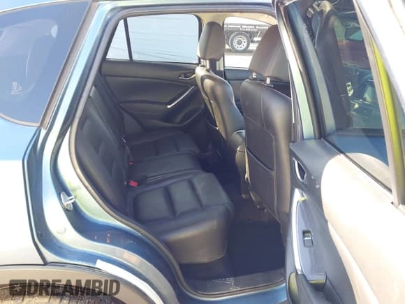 ✅ 2016 Mazda CX-5 Grand Touring • VIN: JM3KE4DY9G0788716 • Lot: 43592205. Listed on IAAI with 92,210 mi. Free auction sales archive from the USA and detailed vehicle history report at DreamBid. Image 8.