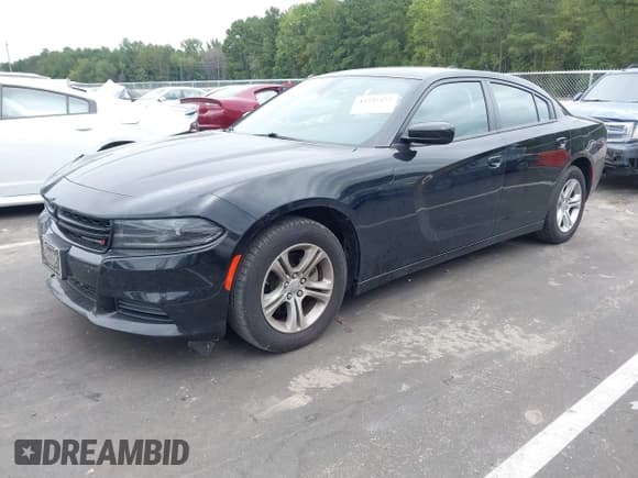 ✅ 2023 Dodge Charger SXT • VIN: 2C3CDXBG5PH579520 • Lot: 43245472. Listed on IAAI with 59,873 mi. Free auction sales archive from the USA and detailed vehicle history report at DreamBid. Image 17.