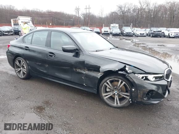 ✅ 2023 BMW 3 Series 330i xDrive • VIN: 3MW89FF0XP8D14920 • Lot: 41812599. Listed on IAAI with 15,897 mi. Free auction sales archive from the USA and detailed vehicle history report at DreamBid. Image 1.