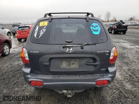 2002 Hyundai Santa Fe GLS z VIN KM8SC73D62U238546, wystawiony jako Copart lot #83797674 z przebiegiem 169 183 mil mil oraz Szkoda całkowita • Salvage title. Historia ofert i sprzedaży dostępna na DreamBid. Obrazek 6.