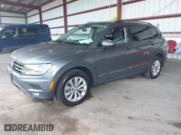 ✅ 2018 Volkswagen Tiguan S • VIN: 3VV0B7AX1JM009711 • Lot: 43117822. Listed on IAAI with 133,173 mi. Free auction sales archive from the USA and detailed vehicle history report at DreamBid. Image 2.