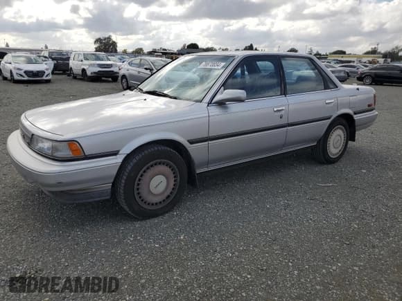 ✅ 1989 Toyota Camry • VIN: JT2VV22E3K0049538 • Lot: 78870034. Wystawiony na Copart z przebiegiem 100 396 mil. Bezpłatny archiwum sprzedaży aukcyjnych z USA i szczegółowy raport historii pojazdu na DreamBid. Zdjęcie 1.