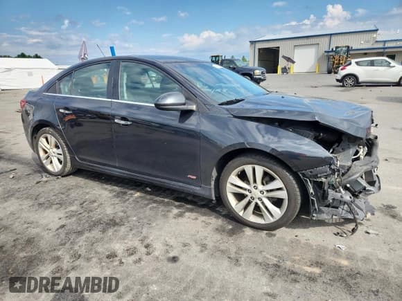 ✅ 2015 Chevrolet Cruze LTZ • VIN: 1G1PG5SB4F7151082 • Lot: 68713325. Listed on Copart with 111,332 mi. Free auction sales archive from the USA and detailed vehicle history report at DreamBid. Image 4.