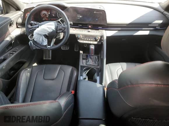 2025 Hyundai Elantra N Line with VIN KMHLR4DFXSU856972, listed as a Copart auction lot 67220125 with 56,412 mi miles and Salvage title. Bid and sale history available at DreamBid. Image 8.