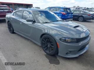 ✅ 2018 Dodge Charger R/T Scat Pack • VIN: 2C3CDXGJ5JH193420 • Lot: 43043636. Listed on IAAI with 75,284 mi. Free auction sales archive from the USA and detailed vehicle history report at DreamBid. Image 1.