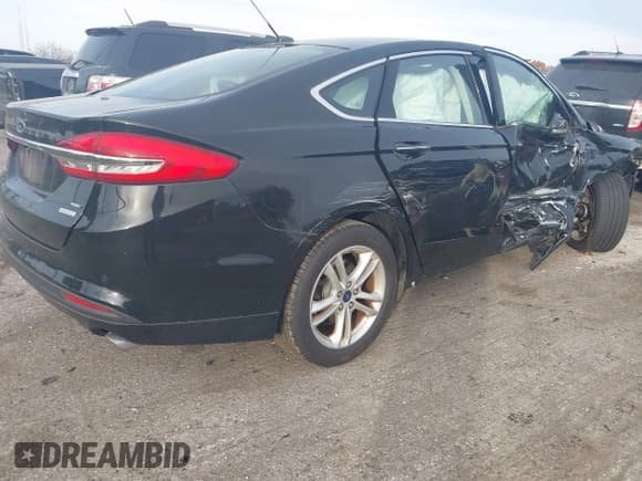 ✅ 2018 Ford Fusion SE • VIN: 3FA6P0HD5JR231044 • Lot: 43630328. Listed on IAAI with 22,697 mi. Free auction sales archive from the USA and detailed vehicle history report at DreamBid. Image 4.