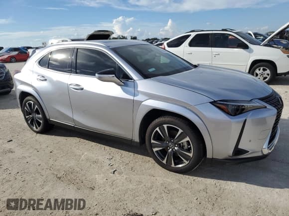 ✅ 2024 Lexus UX 250h Premium • VIN: JTHP6JBH4R2164664 • Lot: 73791184. Listed on Copart with 4,867 mi. Free auction sales archive from the USA and detailed vehicle history report at DreamBid. Image 4.