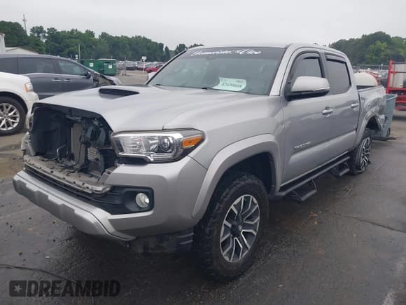 ✅ 2020 Toyota Tacoma SR5 • VIN: 3TMCZ5ANXLM296379 • Lot: 42699808. Listed on IAAI with 39,765 mi. Free auction sales archive from the USA and detailed vehicle history report at DreamBid. Image 2.