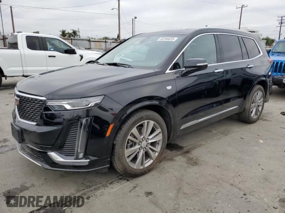 ✅ 2023 Cadillac XT6 FWD Premium Luxury • VIN: 1GYKPCRS5PZ220616 • Лот: 65266635. Опубликован ранее на Copart с пробегом 25 860 миль. Бесплатный доступ к архиву аукционных продаж из США и подробный отчёт об истории автомобиля на DreamBid. Изображение 1.