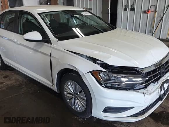 ✅ 2019 Volkswagen Jetta S • VIN: 3VWC57BU8KM076022 • Лот: 81700595. Опубликован ранее на Copart с пробегом 86 691 миль. Бесплатный доступ к архиву аукционных продаж из США и подробный отчёт об истории автомобиля на DreamBid. Изображение 13.