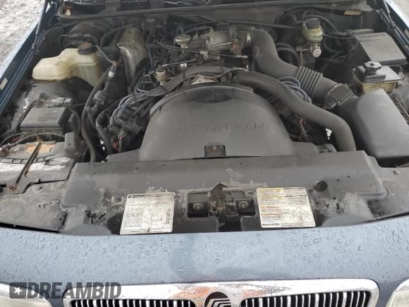 ✅ 1997 Mercury Grand Marquis GS • VIN: 2MELM74W4VX707814 • Lot: 81570244. Wystawiony na Copart z przebiegiem 155 752 mil. Bezpłatny archiwum sprzedaży aukcyjnych z USA i szczegółowy raport historii pojazdu na DreamBid. Zdjęcie 11.