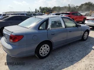 ✅ 2003 Saturn LS • VIN: 1G8JU54F43Y501252 • Лот: 76197934. Опубликован ранее на Copart с пробегом 52 856 миль. Бесплатный доступ к архиву аукционных продаж из США и подробный отчёт об истории автомобиля на DreamBid. Изображение 3.