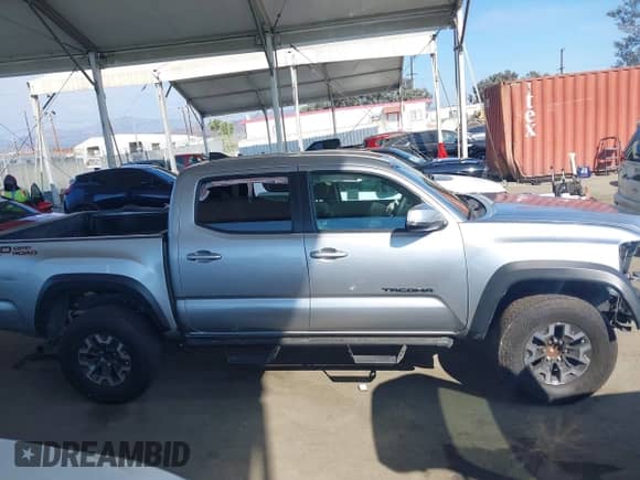 2022 Toyota Tacoma SR5 with VIN 3TMAZ5CN9NM186656, listed as a IAAI auction lot 43253480 with 25,540 mi miles and . Bid and sale history available at DreamBid. Image 13.