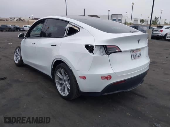 ✅ 2023 Tesla Model Y Long Range • VIN: 7SAYGDEE5PA063097 • Lot: 42171871. Listed on IAAI with Not provided. Free auction sales archive from the USA and detailed vehicle history report at DreamBid. Image 3.