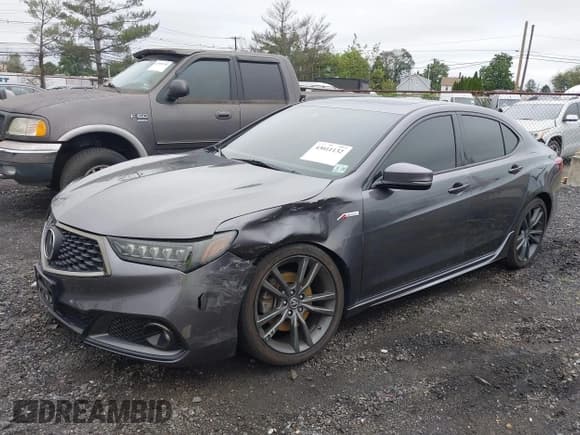 ✅ 2019 Acura TLX w/A-Spec Pkg • VIN: 19UUB2F60KA004390 • Lot: 43011132. Listed on IAAI with 70,672 mi. Free auction sales archive from the USA and detailed vehicle history report at DreamBid. Image 2.