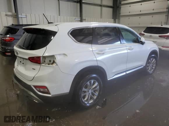2019 Hyundai Santa Fe SE z VIN 5NMS2CAD6KH121639, wystawiony jako Copart lot #70541702 z przebiegiem 31 689 mil mil oraz . Historia ofert i sprzedaży dostępna na DreamBid. Obrazek 3.