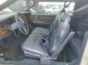 ✅ 1984 Cadillac Eldorado • VIN: 1G6AL5783EE654296 • Lot: 74945374. Listed on Copart with 37,040 mi. Free auction sales archive from the USA and detailed vehicle history report at DreamBid. Image 7.