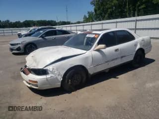 ✅ 1995 Toyota Camry LE • VIN: 4T1GK12E6SU083190 • Lot: 70914815. Wystawiony na Copart z przebiegiem 270 869 mil. Bezpłatny archiwum sprzedaży aukcyjnych z USA i szczegółowy raport historii pojazdu na DreamBid. Zdjęcie 1.