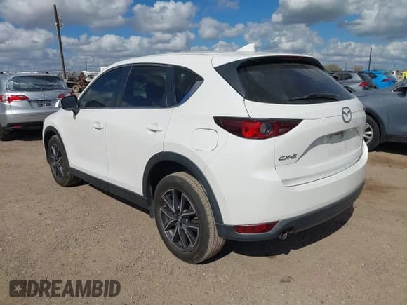 ✅ 2018 Mazda CX-5 Touring • VIN: JM3KFACM6J1409067 • Лот: 43716812. Опубликован ранее на IAAI с пробегом 76 489 миль. Бесплатный доступ к архиву аукционных продаж из США и подробный отчёт об истории автомобиля на DreamBid. Изображение 3.