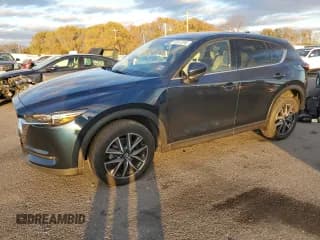 ✅ 2018 Mazda CX-5 Grand Touring • VIN: JM3KFBDM2J0340940 • Lot: 92372345. Listed on Copart with 91,288 mi. Free auction sales archive from the USA and detailed vehicle history report at DreamBid. Image 1.