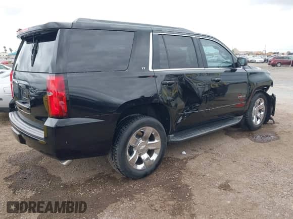 2016 Chevrolet Tahoe LT with VIN 1GNSCBKC5GR103401, listed as a IAAI auction lot 42068440 with 117,662 mi miles and . Bid and sale history available at DreamBid. Image 4.