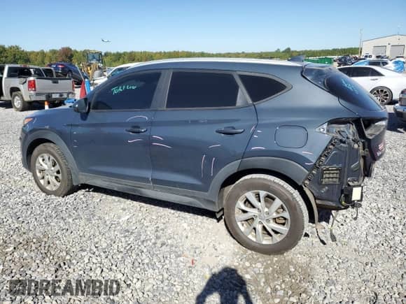 2021 Hyundai Tucson Value with VIN KM8J33A44MU305509, listed as a Copart auction lot 89531555 with 57,548 mi miles and Salvage title. Bid and sale history available at DreamBid. Image 2.