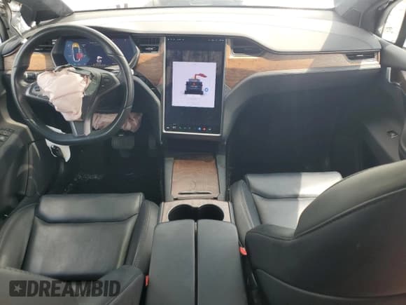 ✅ 2021 Tesla Model X Long Range Plus • VIN: 5YJXCDE26MF321930 • Lot: 64676215. Listed on Copart with 83,131 mi. Free auction sales archive from the USA and detailed vehicle history report at DreamBid. Image 8.