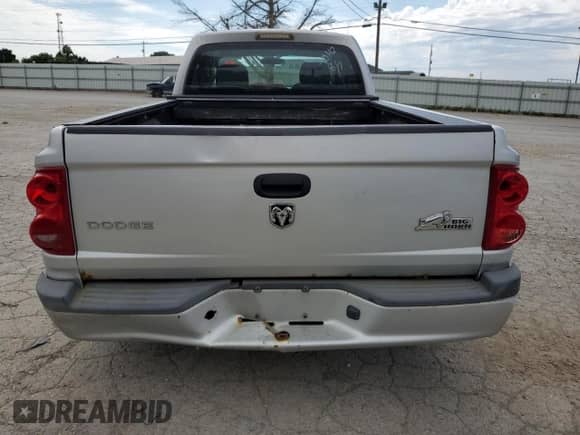 2009 Dodge Dakota Bighorn/Lonestar z VIN 1D7HE32K69S714842, wystawiony jako Copart lot #60810424 z przebiegiem 237 408 mil mil oraz Szkoda całkowita • Salvage title. Historia ofert i sprzedaży dostępna na DreamBid. Obrazek 6.