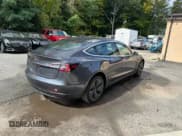 ✅ 2018 Tesla Model 3 Long Range Battery • VIN: 5YJ3E1EB1JF119497 • Lot: 86625345. Listed on Copart with 122,564 mi. Free auction sales archive from the USA and detailed vehicle history report at DreamBid. Image 4.