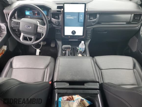 ✅ 2023 Ford F-150 Lightning Lariat • VIN: 1FTVW1EV0PWG12849 • Lot: 87083755. Listed on Copart with 35,557 mi. Free auction sales archive from the USA and detailed vehicle history report at DreamBid. Image 8.