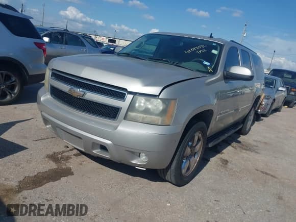 ✅ 2008 Chevrolet Suburban 2LT • VIN: 3GNFC16038G299755 • Lot: 42088092. Listed on IAAI with 141,876 mi. Free auction sales archive from the USA and detailed vehicle history report at DreamBid. Image 2.