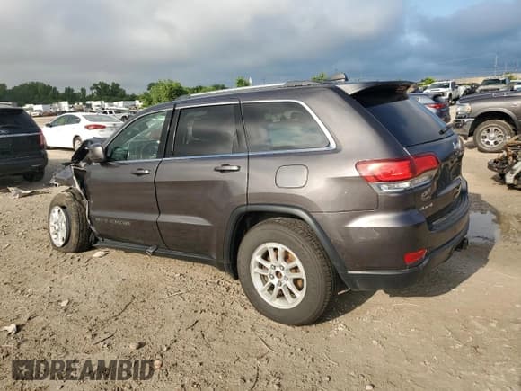 ✅ 2020 Jeep Grand Cherokee Laredo • VIN: 1C4RJFAG5LC438938 • Lot: 68344325. Listed on Copart with 100,936 mi. Free auction sales archive from the USA and detailed vehicle history report at DreamBid. Image 2.