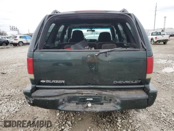 2001 Chevrolet Blazer LS с VIN 1GNCS13W91K254624, выставлен на аукционе Copart как лот 80281444 с пробегом 189 843 миль миль и Списание • Salvage title. История ставок и продаж доступна на DreamBid. Изображение 6.
