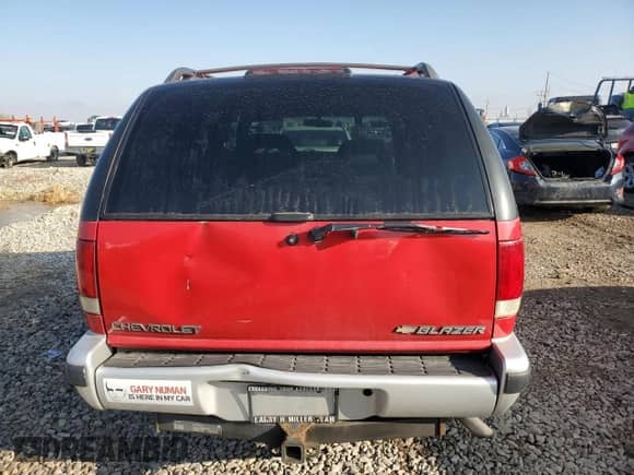 1995 Chevrolet Blazer z VIN 1GNDT13W4S2243226, wystawiony jako Copart lot #81429904 z przebiegiem 1 757 497 mil mil oraz Szkoda całkowita • Salvage title. Historia ofert i sprzedaży dostępna na DreamBid. Obrazek 6.