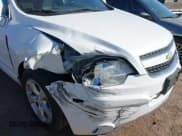 ✅ 2014 Chevrolet Captiva Sport LT • VIN: 3GNAL3EK6ES652197 • Lot: 42450352. Wystawiony na IAAI z przebiegiem 110 723 mil. Bezpłatny archiwum sprzedaży aukcyjnych z USA i szczegółowy raport historii pojazdu na DreamBid. Zdjęcie 6.