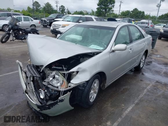 ✅ 2004 Toyota Camry LE • VIN: 4T1BF32K24U070150 • Lot: 42390540. Listed on IAAI with 380,768 mi. Free auction sales archive from the USA and detailed vehicle history report at DreamBid. Image 2.
