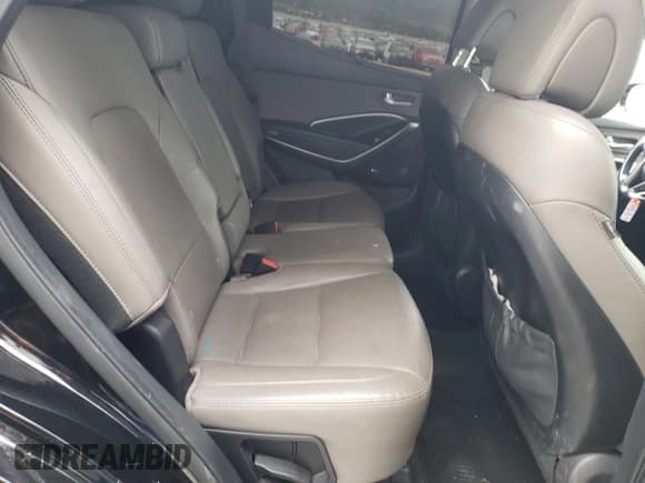 ✅ 2017 Hyundai Santa Fe Ultimate • VIN: 5XYZWDLA9HG413638 • Лот: 56983724. Опубликован ранее на Copart с пробегом 101 687 миль. Бесплатный доступ к архиву аукционных продаж из США и подробный отчёт об истории автомобиля на DreamBid. Изображение 11.